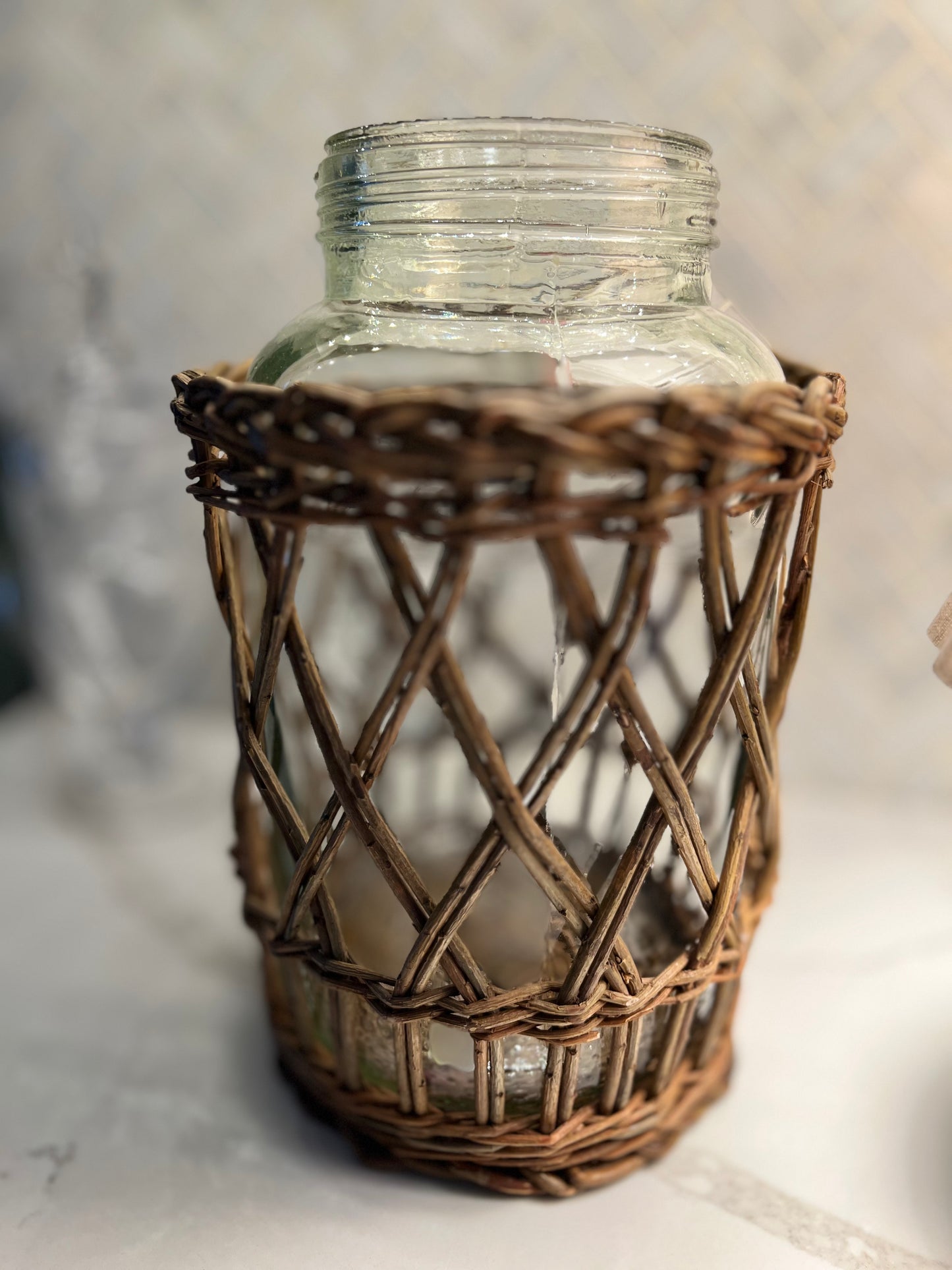 Large Jar With Woven Basket Covering